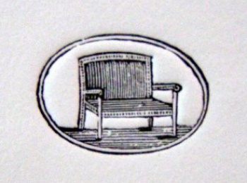 В горизонтальном двойном овале изображен диван.