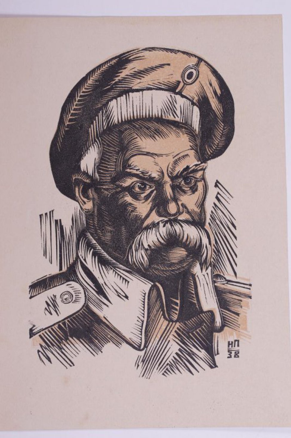 Погрдное изображение Т.Г.Шевченко в солдатской одежде. Голова слегка повернута влево.